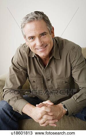 Portrait of smiling mature man View Large Photo Image Stock Image - Portrait of smiling mature man. Fotosearch
