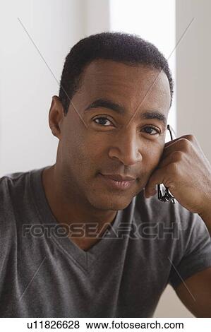 Portrait of smiling mature man View Large Photo Image Stock Photo - Portrait of smiling mature man. Fotosearch