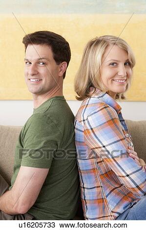 Portrait of smiling mid adult couple View Large Photo Image Stock Image - Portrait of smiling mid adult couple. Fotosearch