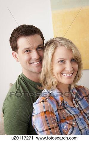 Portrait of smiling mid adult couple View Large Photo Image Stock Image - Portrait of smiling mid adult couple. Fotosearch