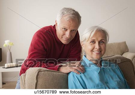 Stock Photo - Portrait of smiling senior couple. Fotosearch