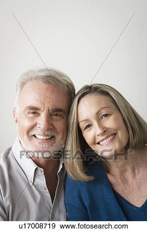 Portrait of smiling senior couple View Large Photo Image Stock Photo - Portrait of smiling senior couple. Fotosearch