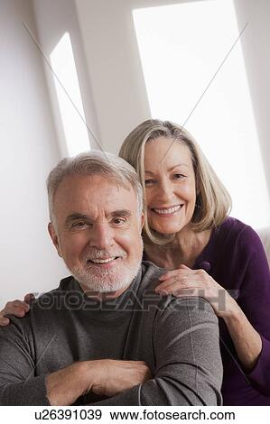 Portrait of smiling senior couple View Large Photo Image Stock Photo - Portrait of smiling senior couple. Fotosearch