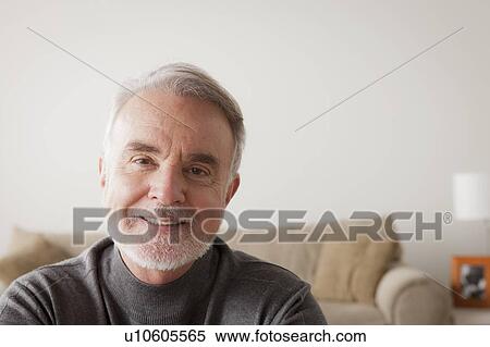 Stock Photography - Portrait of smiling senior man. Fotosearch