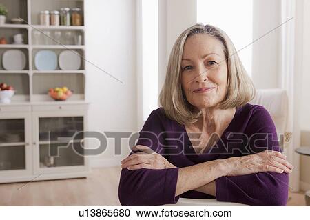 Portrait of smiling senior woman View Large Photo Image Stock Image - Portrait of smiling senior woman. Fotosearch