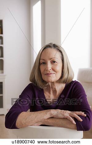 Portrait of smiling senior woman View Large Photo Image Stock Image - Portrait of smiling senior woman. Fotosearch