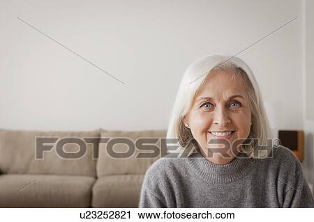 Portrait of smiling senior woman View Large Photo Image Stock Image - Portrait of smiling senior woman. Fotosearch