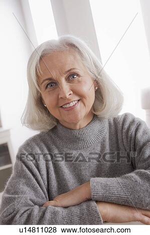 Stock Photo - Portrait of smiling senior woman. Fotosearch