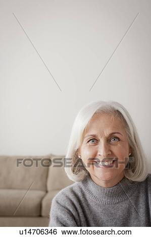 Stock Photograph - Portrait of smiling senior woman. Fotosearch