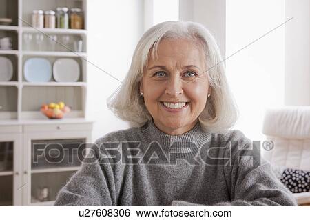 Stock Photograph - Portrait of smiling senior woman. Fotosearch