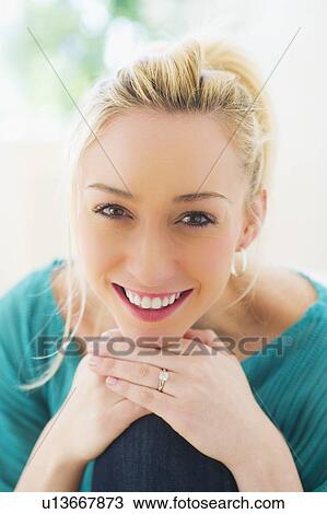 Portrait of smiling young woman View Large Photo Image Stock Image - Portrait of smiling young woman . Fotosearch