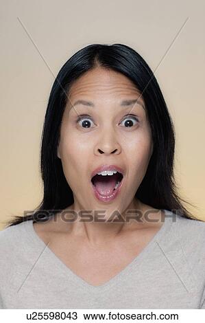 Portrait of woman with astonished expression View Large Photo Image Stock Image - Portrait of woman with astonished expression. Fotosearch