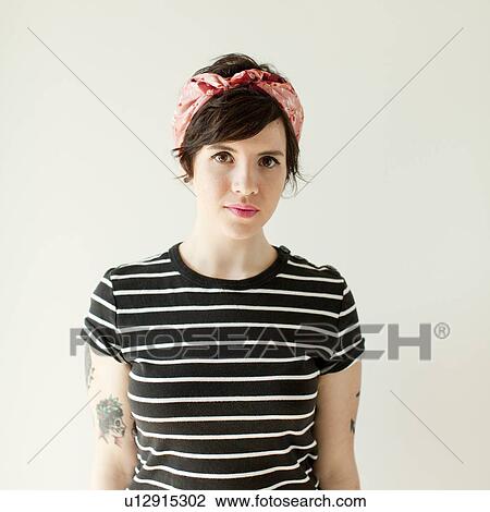 Stock Image - Portrait of young woman. Fotosearch