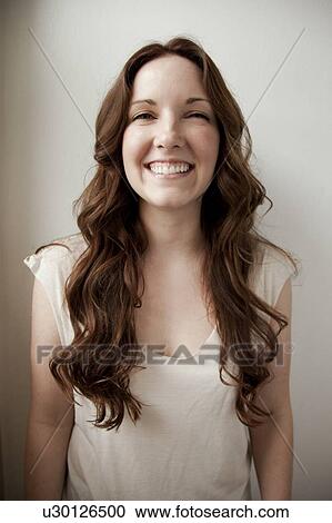 Stock Image - Portrait of young woman. Fotosearch
