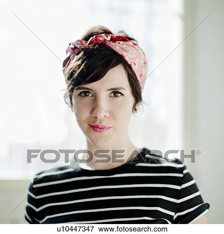 Stock Photo - Portrait of young woman. Fotosearch