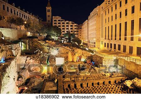 Stock Image - Roman ruins at night. Fotosearch