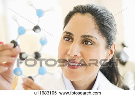 Scientist holding molecular model View Large Photo Image Stock Photography - Scientist holding molecular model. Fotosearch