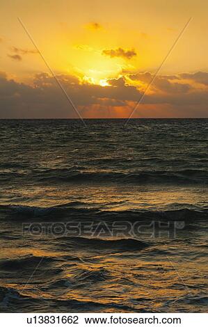 Seascape at sunset View Large Photo Image Stock Image - Seascape at sunset. Fotosearch