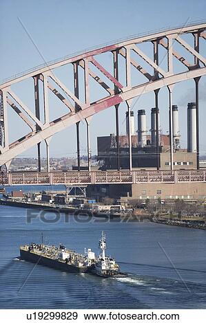 Ship under bridge View Large Photo Image Stock Photo - Ship under bridge. Fotosearch
