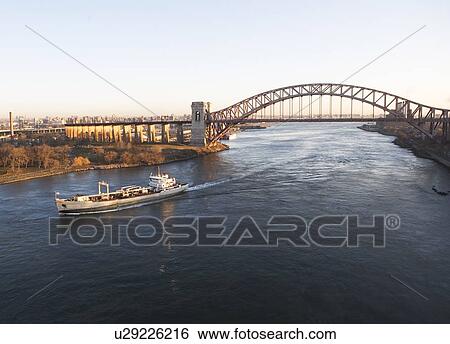 Ship under bridge View Large Photo Image Stock Photograph - Ship under bridge. Fotosearch