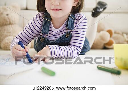 Small girl (4-5 years) coloring paper View Large Photo Image Stock Photography - Small girl (4-5 years) coloring paper. Fotosearch