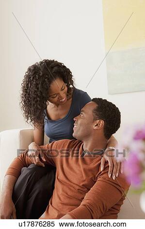 Stock Photography - Smiling mid adult couple together. Fotosearch