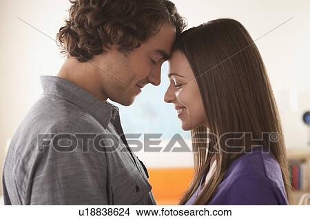 Picture - Smiling young couple together. Fotosearch