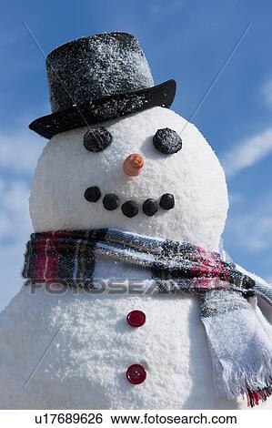 Snowman under blue sky View Large Photo Image Stock Photograph - Snowman under blue sky. Fotosearch