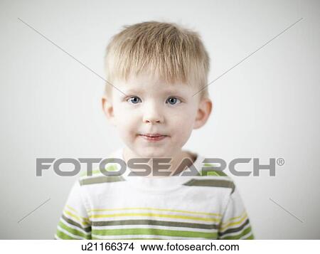 Studio portrait of happy toddler boy (2-3) View Large Photo Image Picture - Studio portrait of happy toddler boy (2-3). Fotosearch