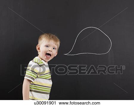 Studio portrait of happy toddler boy (2-3) with blank speech bubble written on blackboard View Large Photo Image Stock Image - Studio portrait of happy toddler boy (2-3) with blank speech bubble written on blackboard. Fotosearch