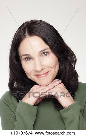 Studio portrait of mature woman View Large Photo Image Picture - Studio portrait of mature woman. Fotosearch