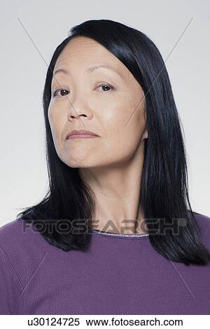 Studio portrait of mature woman View Large Photo Image Stock Photography - Studio portrait of mature woman. Fotosearch
