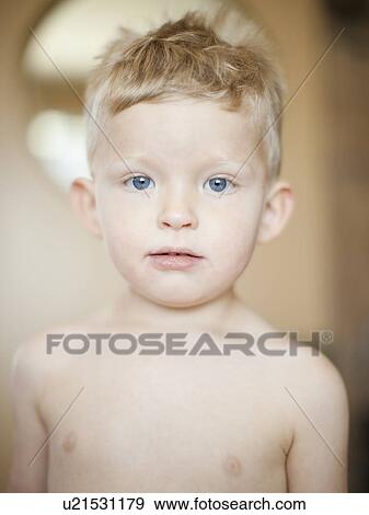 Studio portrait of shitless toddler boy (2-3) View Large Photo Image Stock Photo - Studio portrait of shitless toddler boy (2-3). Fotosearch