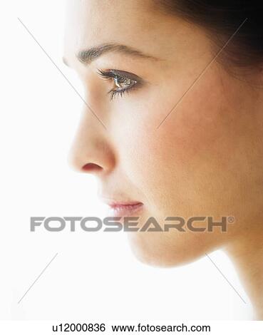 Studio portrait of young woman View Large Photo Image Stock Photograph - Studio portrait of young woman. Fotosearch