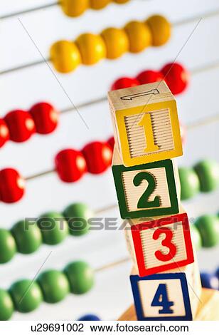 Studio shot of abacus and wooden blocks View Large Photo Image Stock Image - Studio shot of abacus and wooden blocks. Fotosearch