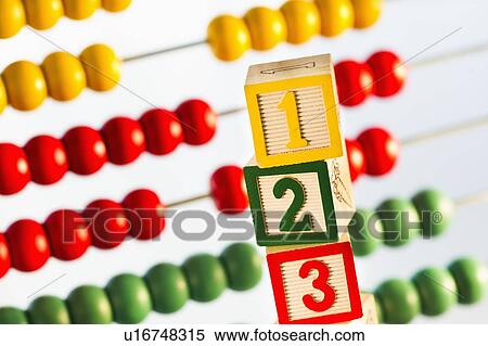 Studio shot of abacus and wooden blocks View Large Photo Image Stock Photography - Studio shot of abacus and wooden blocks. Fotosearch
