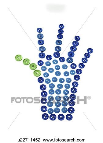 Stock Image - Studio shot of blue and green buttons arranged in human hand. Fotosearch