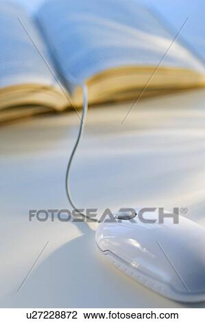 Studio shot of book with computer mouse View Large Photo Image Stock Image - Studio shot of book with computer mouse. Fotosearch