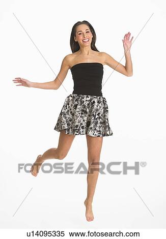 Studio shot of enthusiastic woman View Large Photo Image Stock Photography - Studio shot of enthusiastic woman. Fotosearch