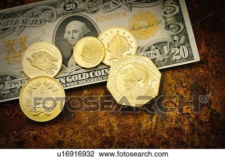 Stock Image - Studio shot of gold coins. Fotosearch