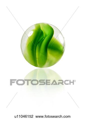 Stock Image - Studio shot of green marbles arranged in Exclamation Point. Fotosearch