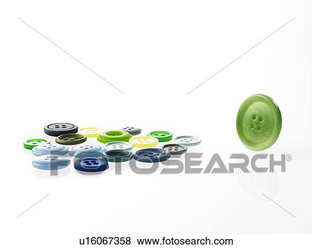 Stock Photo - Studio shot of green marbles arranged in Exclamation Point. Fotosearch