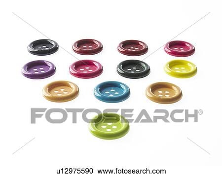 Stock Image - Studio shot of large group of multi colored buttons. Fotosearch