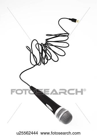 Studio shot of microphone and microphone cable on white background View Large Photo Image Picture - Studio shot of microphone and microphone cable on white background. Fotosearch