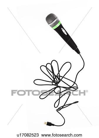Studio shot of microphone and microphone cable on white background View Large Photo Image Stock Image - Studio shot of microphone and microphone cable on white background. Fotosearch