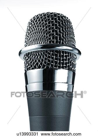 Studio shot of microphone on white background View Large Photo Image Stock Image - Studio shot of microphone on white background. Fotosearch