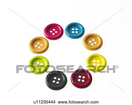 Studio shot of multi colored buttons arranged in circle View Large Photo Image Picture - Studio shot of multi colored buttons arranged in circle. Fotosearch