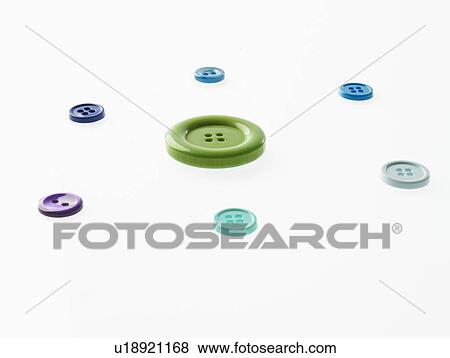 Studio shot of multi colored buttons arranged in circle View Large Photo Image Stock Photo - Studio shot of multi colored buttons arranged in circle. Fotosearch
