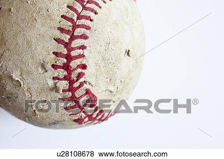 Stock Photo - Studio shot of old baseball ball. Fotosearch