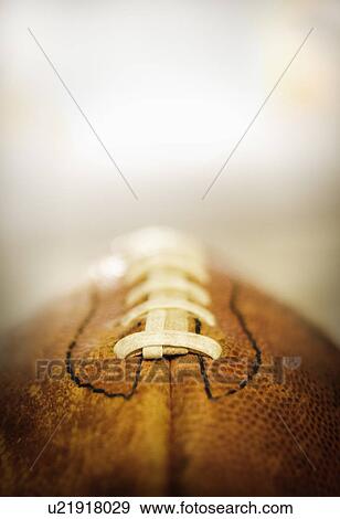 Studio shot of old football View Large Photo Image Stock Photo - Studio shot of old football. Fotosearch